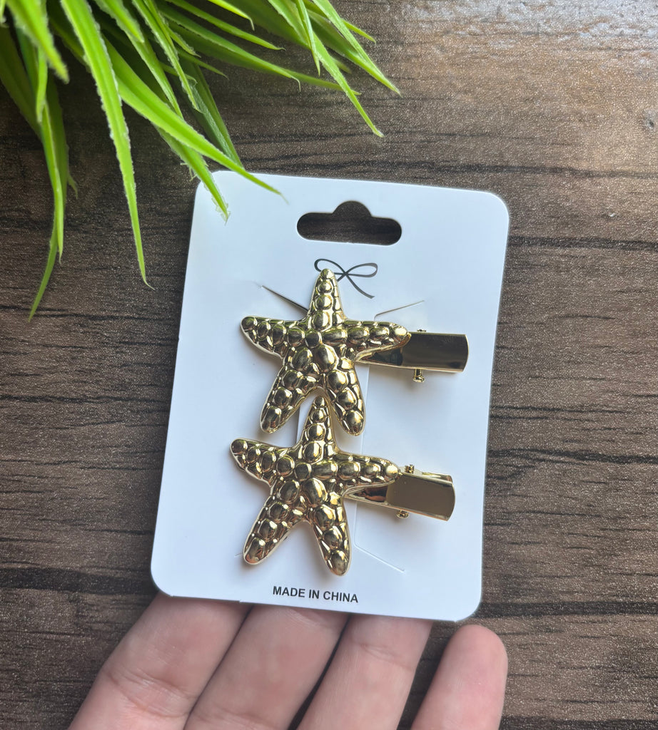 ٢ توكة مشبك معدن لون دهبي السعر ٢٥