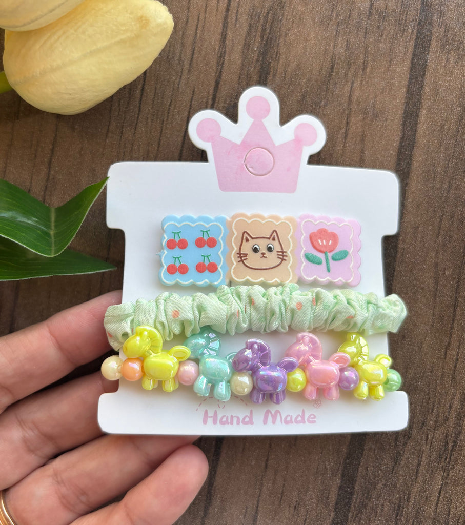 طقم أطفال حظاظة شكل يونيكورن + توكة استك مدكك قماش + تيك تاك اشكال عشوائي سعر الطقم ١٥