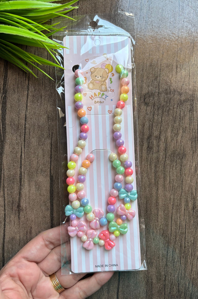 طقم اطفال عقد و حظاظة شكل فيونكة السعر ٢٠