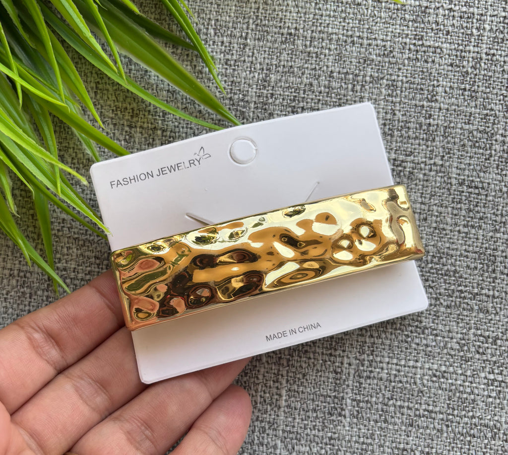 توكة كلبس معدن اشكال SHEIN  شكل مستطيل مضلع لون دهبي السعر ٣٠