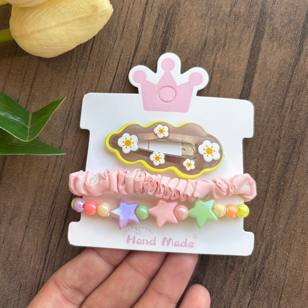 طقم أطفال حظاظة شكل نجوم + توكة استك مدكك قماش + تيك تاك اشكال عشوائي سعر الطقم ١٥