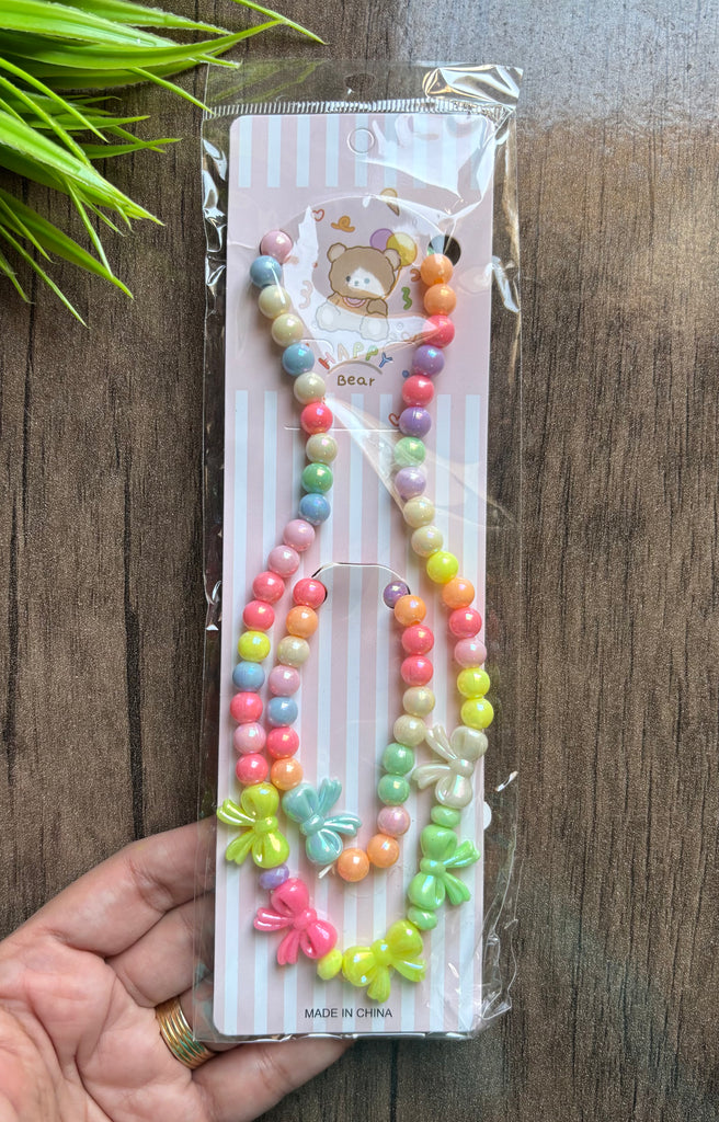 طقم اطفال عقد و حظاظة شكل فيونكة طويلة السعر ٢٠