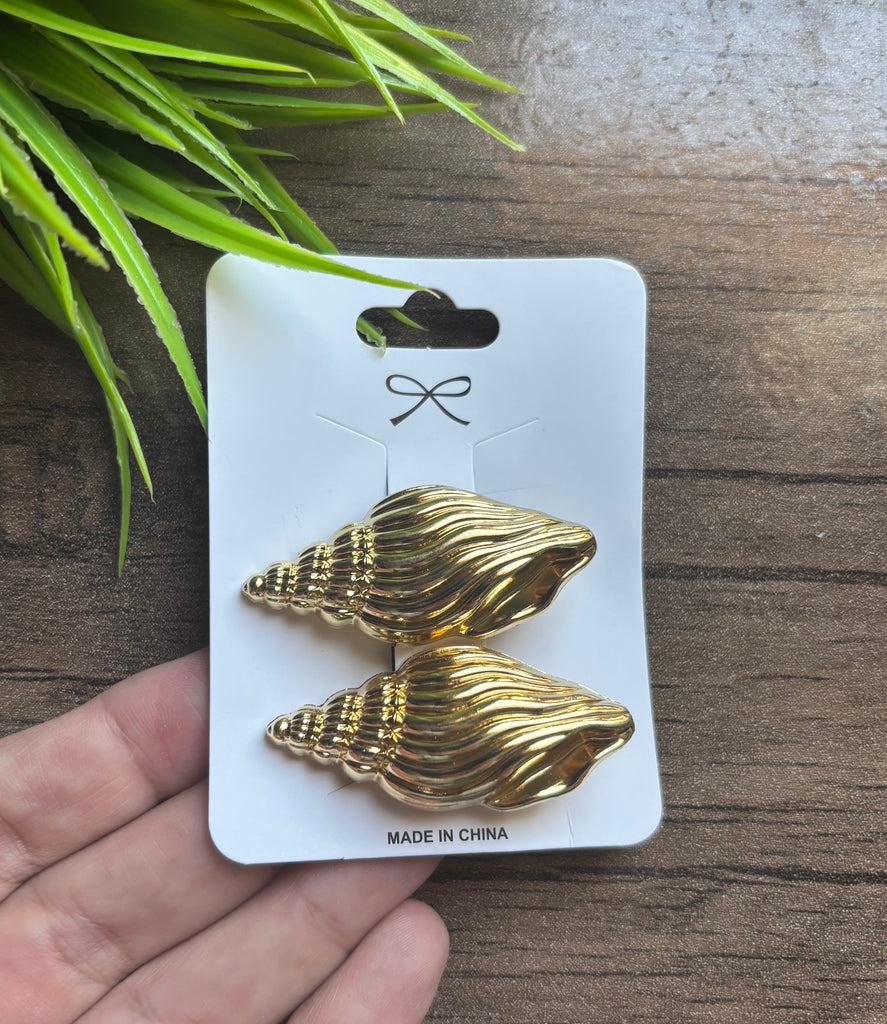 ٢ توكة مشبك معدن لون دهبي السعر ٢٥