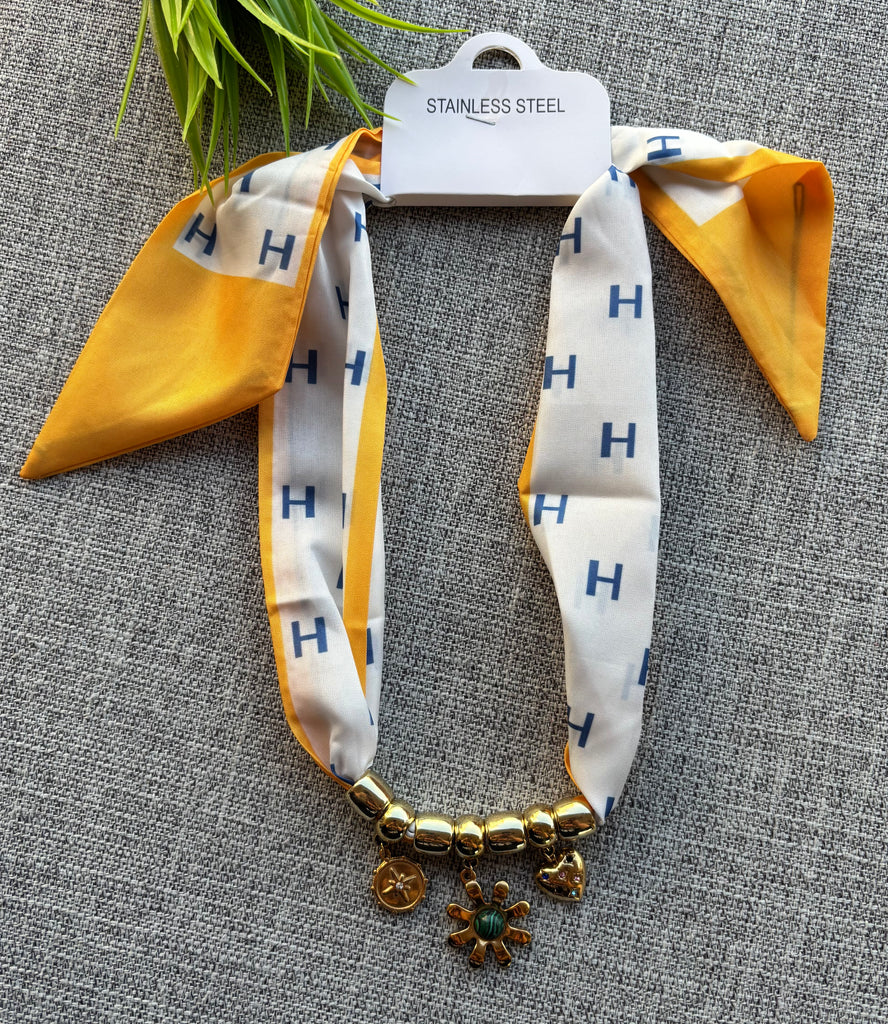 Scarf necklace with stainless charms for 140 EGP