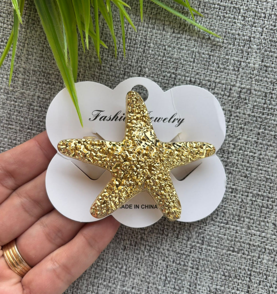 توكة كلبس معدن اشكال SHEIN  شكل نجمة البحر لون دهبي السعر ٣٠