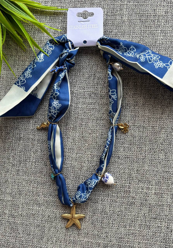Scarf necklace 
stainless charms 
السعر ١٣٠