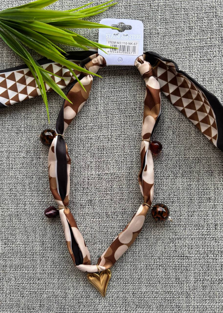 Scarf necklace 
stainless charms 
السعر ١٣٠