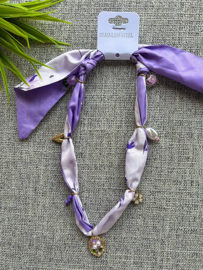 Scarf necklace 
stainless charms 
السعر ١٣٠